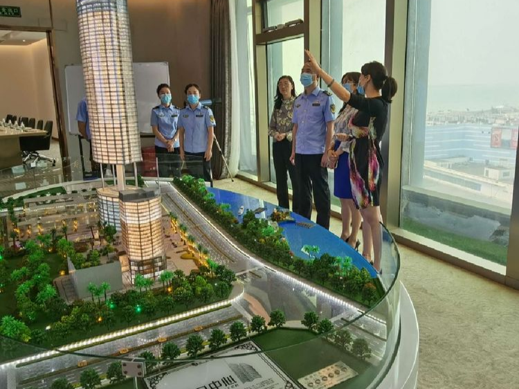 海口市场监管秀英分局走访调研海口世贸大厦